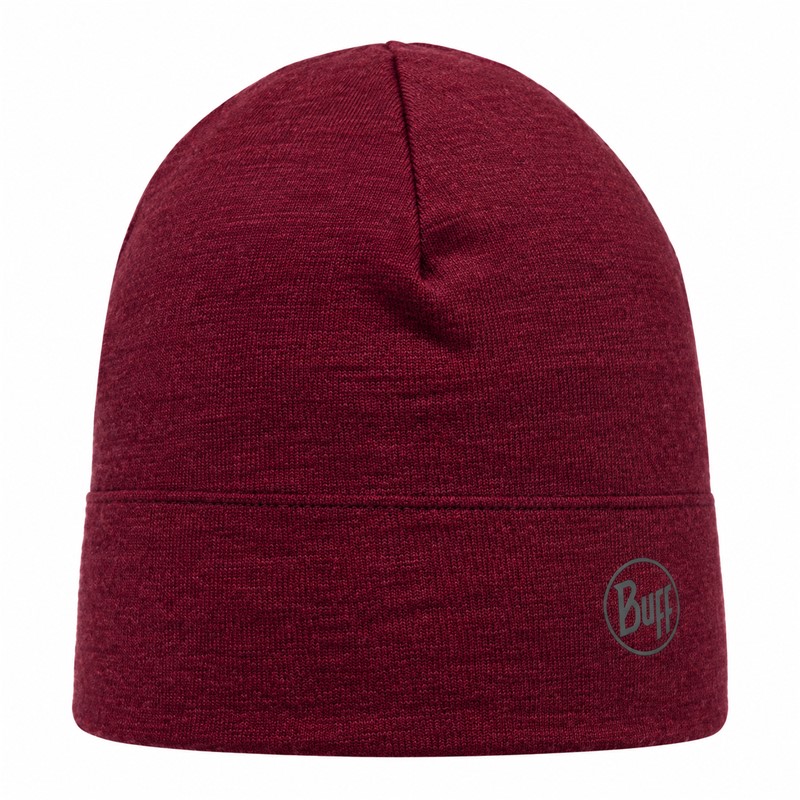 Topla in udobna kapa BUFF® Merino Midweight Beanie Melange Tibetan Red iz 100 % naravne merino volne za pohodništvo, zimske sprehode in vsakodnevno uporabo v hladnem vremenu.