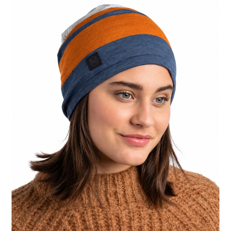 Topla in udobna pletena kapa BUFF® Merino Move Beanie Steel Blue iz 91 % merino volne z gramaturo 250 g/m², brezšivno konstrukcijo in privlačnim barvnim dizajnom za pohodništvo, zimske sprehode in vsakodnevno uporabo.