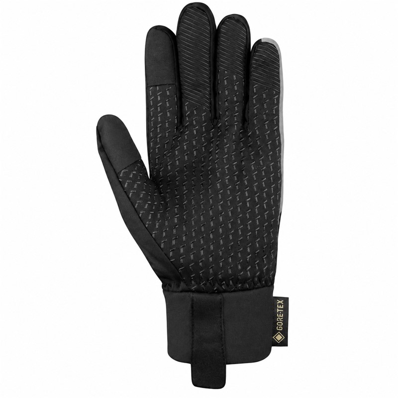 Multifunkcijske rokavice REUSCH COMMUTER GORE-TEX TOUCH-TEC™ v barvi BLACK/SILVER z nepremočljivo in zračno membrano GORE-TEX®, izolacijo TecFill™, zunanjo tkanino Softshell, notranjo podlogo MicroActive, tehnologijo TOUCH-TEC™ za uporabo zaslonov na dotik in odsevnimi elementi. Primerne za pohodništvo, kolesarjenje, sprehode in vsakodnevno uporabo v hladnem ter mokrem vremenu.