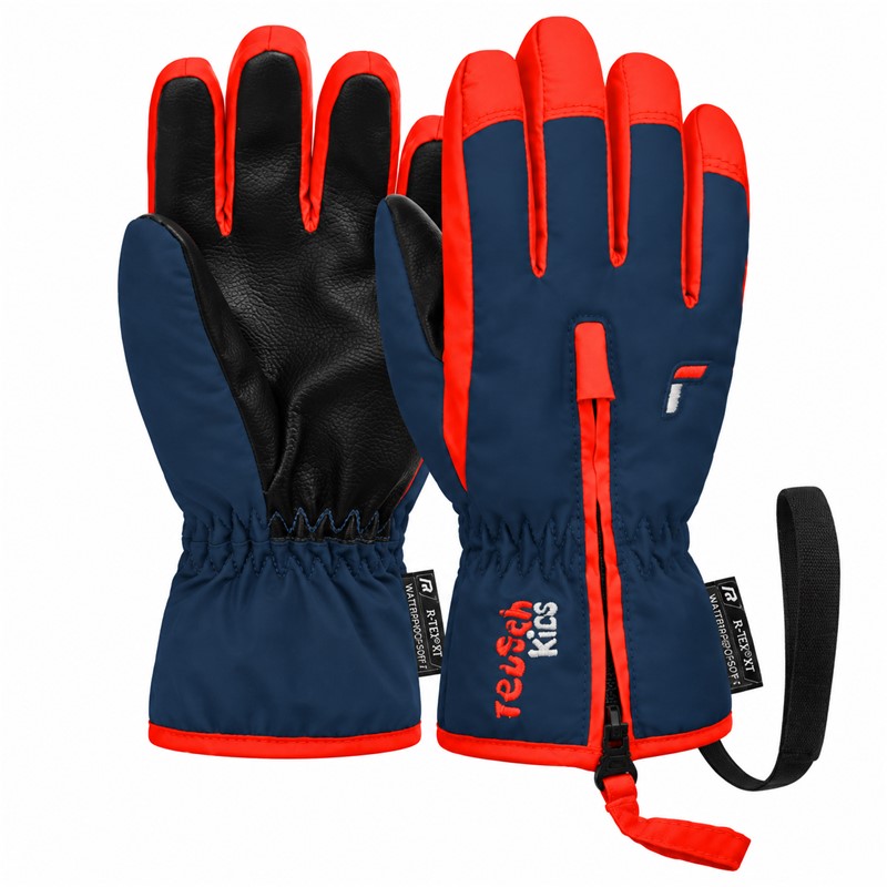 Otroške smučarske rokavice REUSCH BEN v barvni kombinaciji DRESS BLUE / CHERRY TOMATO. Izjemno topla izolacija R-LOFT™, dolga zadrga za enostavno oblačenje, dlan Quantum PU, mehka podloga MicroActive in varnostni trak Baby Leash zagotavljajo toploto, udobje ter praktičnost med zimskimi aktivnostmi najmlajših.
