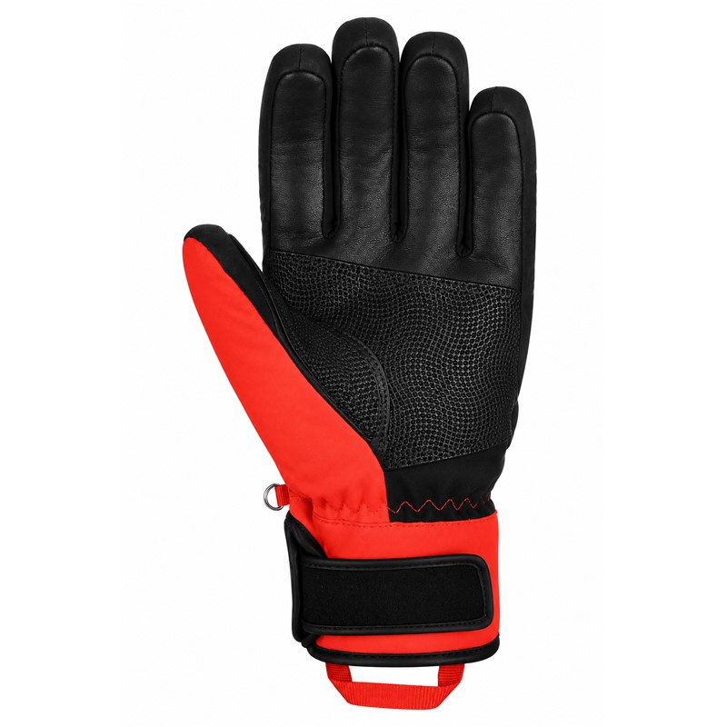 Otroške smučarske rokavice REUSCH WORLDCUP WARRIOR PRIME R-TEX® XT JUNIOR v barvni kombinaciji BLACK / WHITE / FLUO RED. Nepremočljiva in zračna membrana R-TEX® XT, izolacija TecFill™, dlan Quantum PU, mehka zaščita členkov in prstov, keramični potisk ter nastavljivo zapenjanje na ježka zagotavljajo funkcionalnost, toploto in športen videz med smučanjem.