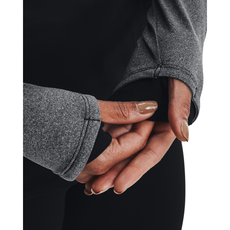 Ženska športna majica UA ColdGear 1/2 ZIP, pod blagovno znamko Under Armour, je zasnovana tako, da zagotavlja udobje, toploto in funkcionalnost med športnimi aktivnostmi v hladnejših pogojih